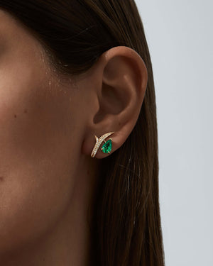 Thorn Embrace Pear Emerald Stud Earrings worn on ear, luxury fine jewellery styling