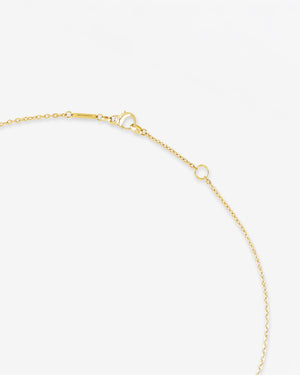 Detail of 18 ct yellow gold craftsmanship on the Thorn Embrace Tear Drop Necklace