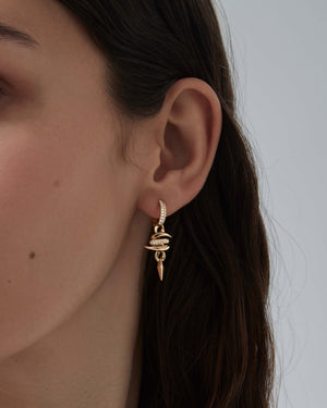 Thorn Embrace Entwined Drop Earrings in 18ct yellow gold worn on ear, luxury jewellery styling