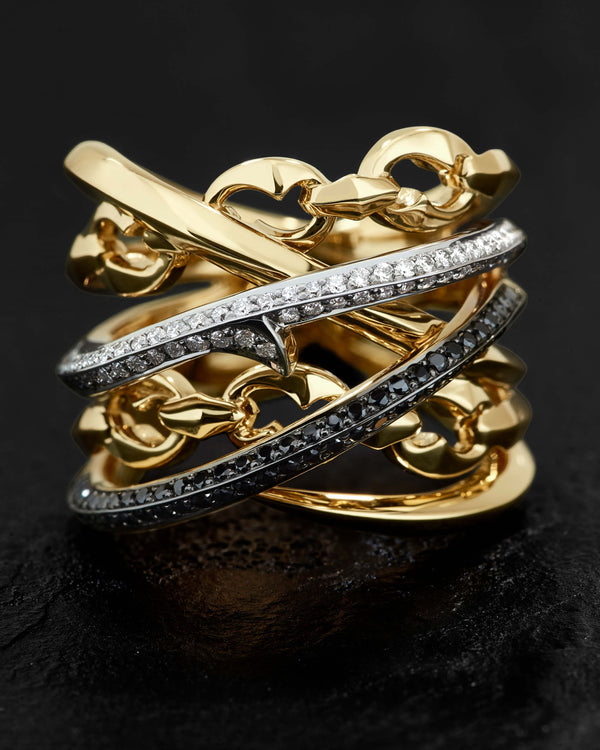 Detail of 18ct yellow and white gold craftsmanship on the Thorn Embrace Bound Together Large Band Ring