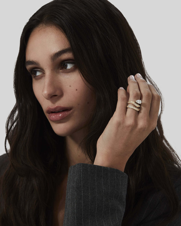 Thorn Floating Solitaire Pavé Ring by Stephen Webster in 18K yellow gold with pear-cut white diamond and pavé-set white diamonds