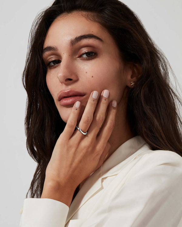 Stephen Webster Thorn Floating Solitaire Slimline Band worn on hand in platinum