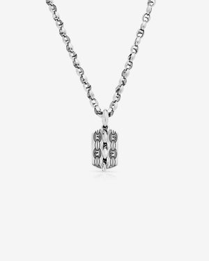 Reverse view of Stephen Webster Thorn Medium Razer Tag Malachite necklace showcasing engraved Thorn design and polished sterling silver