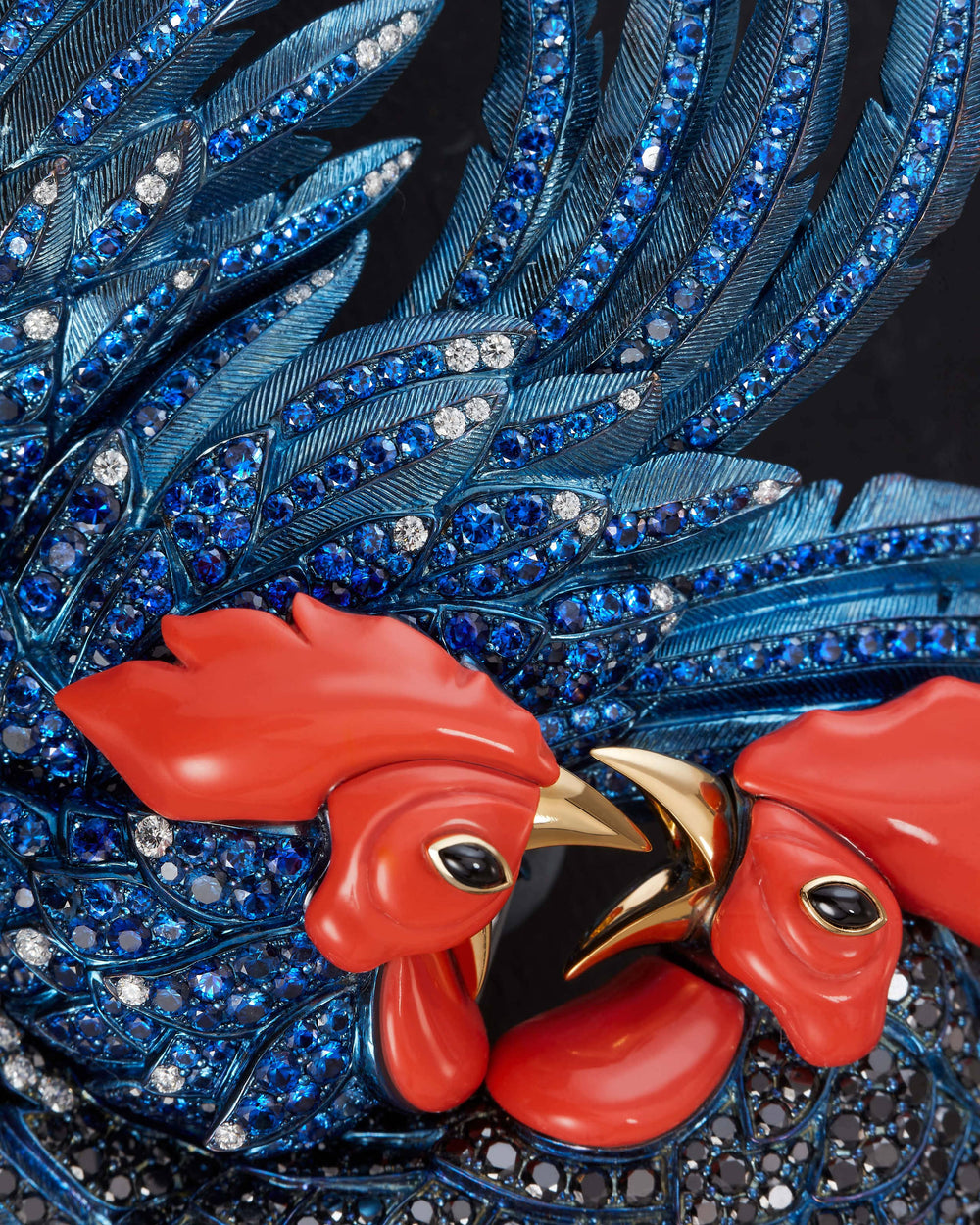 Titanium Cock Fight Brooch — blue titanium brooch set with black and white diamonds, blue sapphires, onyx eyes and 18 ct yellow-gold beak, front view
