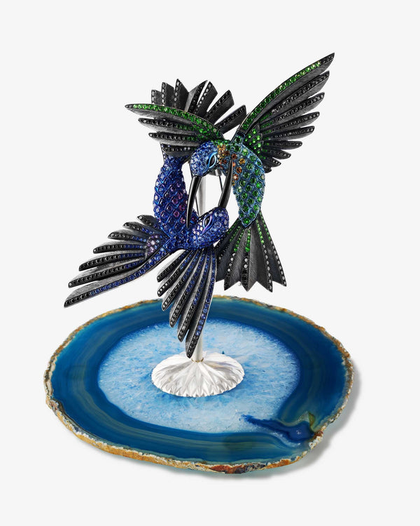 Flat-lay view of Flight Encounter Brooch on neutral background — top-down view