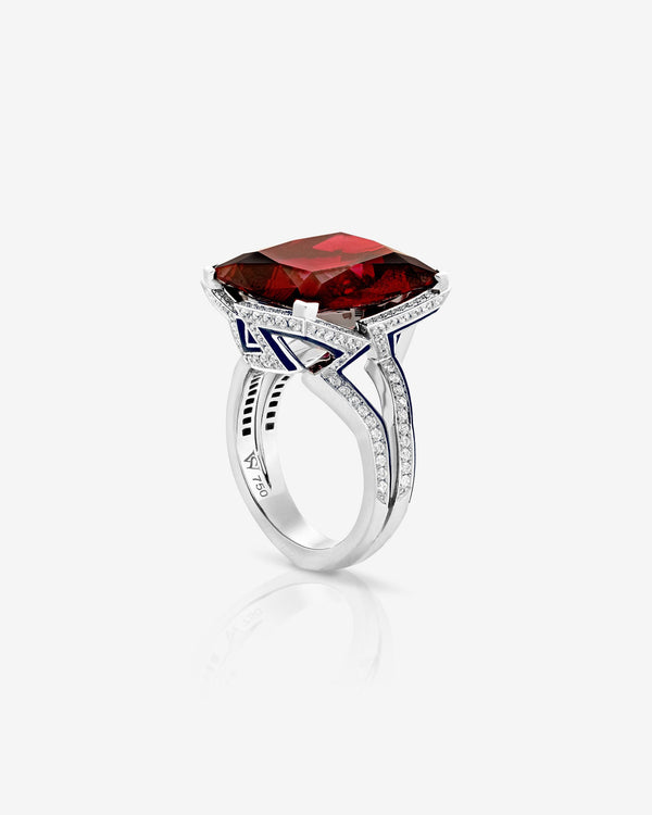 Vertigo Impossible red garnet cocktail ring in 18 ct white gold with dark blue enamel and diamonds — front view