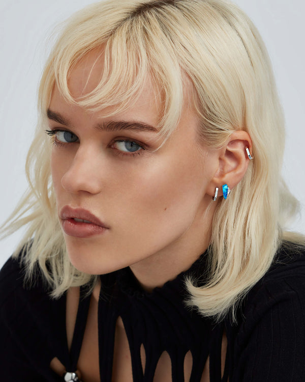 White diamond baguette sleeper earrings styled with other Stephen Webster Crystal Haze jewellery