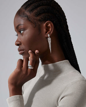 White Diamond Pavé Tail Feather Long Drop Earrings styled with other feather-inspired fine jewellery pieces