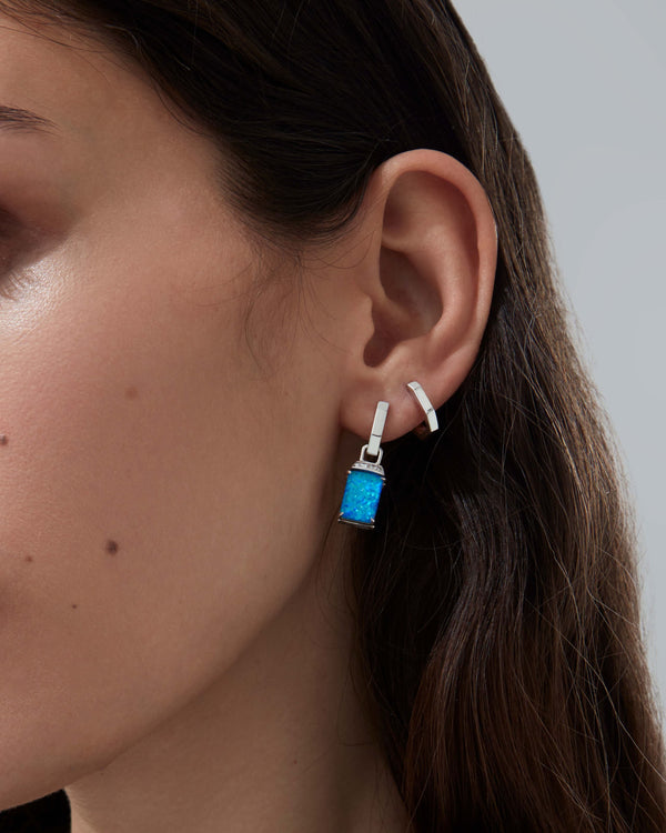 Close-up of polished 18ct white gold sleepers earrings