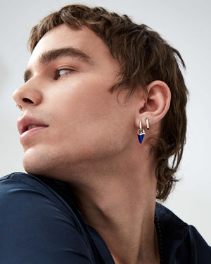 White gold sleepers earrings worn on the ear in 18ct white gold