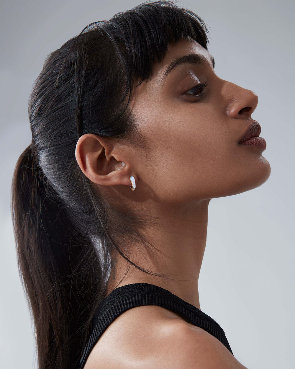 Stephen Webster white opalescent Crystal Haze sleeper earrings in 18ct yellow gold with white opalescent Crystal Haze and diamond accents