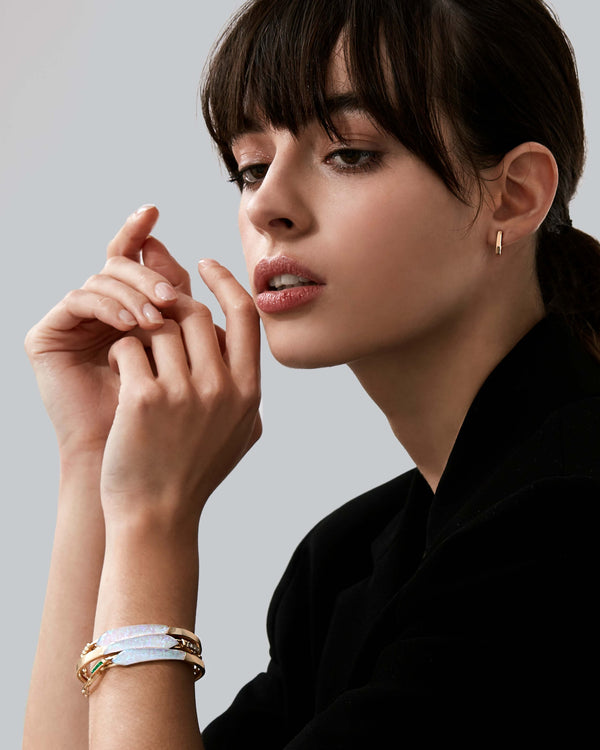 White opalescent and diamonds shard linked bracelet styled with other Stephen Webster Crystal Haze jewellery