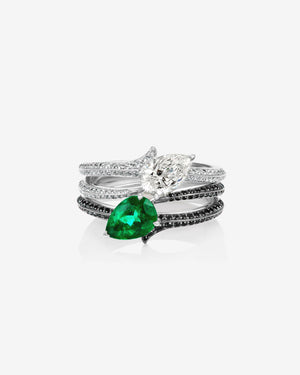 Women’s 18ct white gold Opposites Attract ring with black and white diamond pavé, pear diamond and emerald