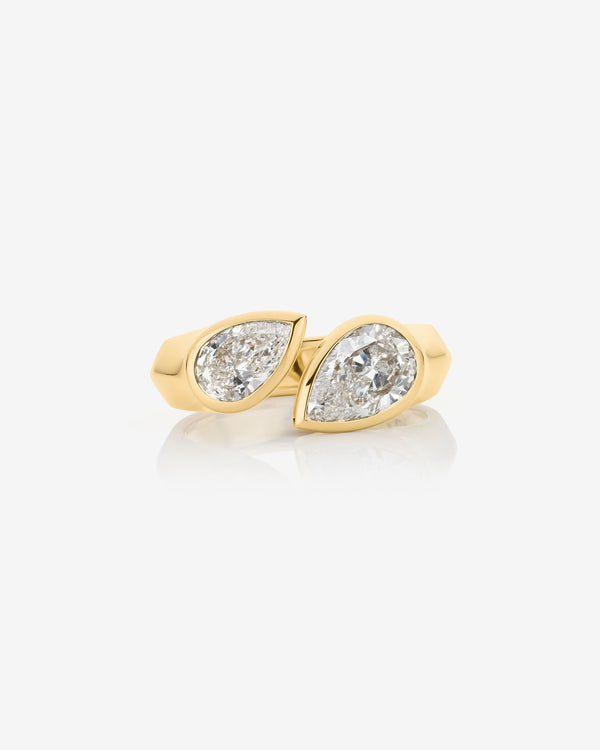 Women’s 18ct yellow gold Toi et Moi engagement ring with two pear-cut white diamonds