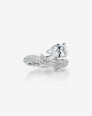 Women’s platinum Thorn Floating Solitaire Pavé engagement ring with pear-cut white diamond and pavé diamonds