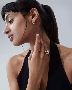 Yellow gold sleepers earrings worn on the ear in 18ct yellow gold